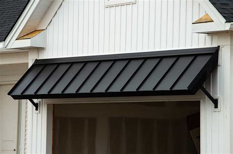 awning metal roof brackets over garage|awning hinge brackets.